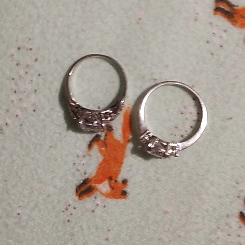2 cubic zirconia rings both included